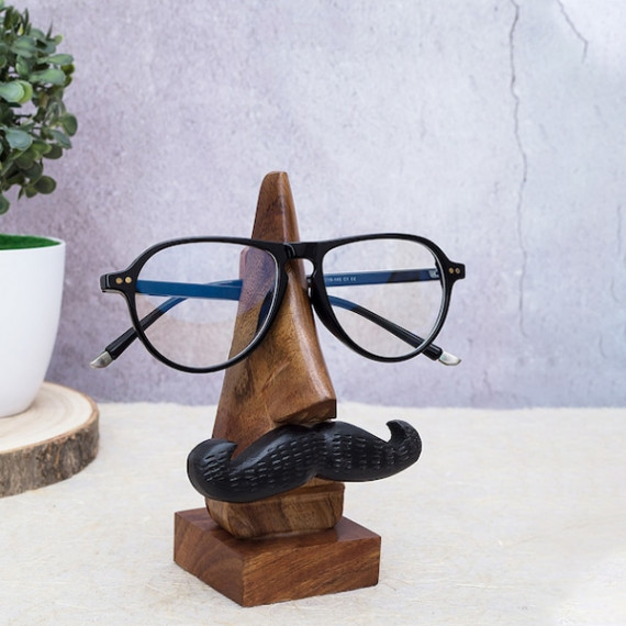 https://designerszone.in/vi/products/brown-handcrafted-eyeglass-holder-showpiece