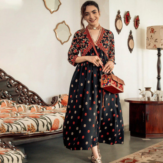 https://designerszone.in/vi/products/black-orange-ethnic-motifs-printed-maxi-dress