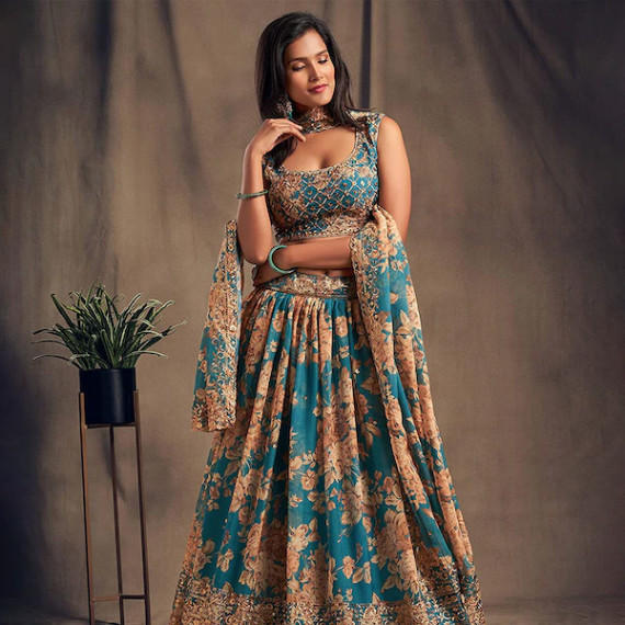 https://designerszone.in/vi/products/blue-beige-printed-semi-stitched-lehenga-unstitched-blouse-with-dupatta